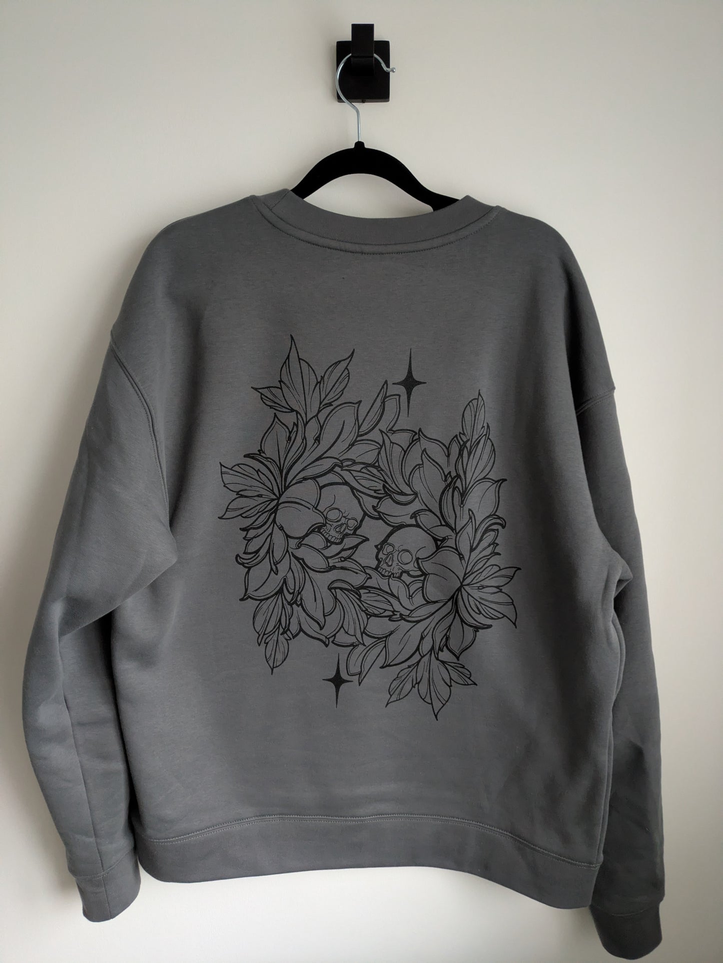 Floral skull sweater